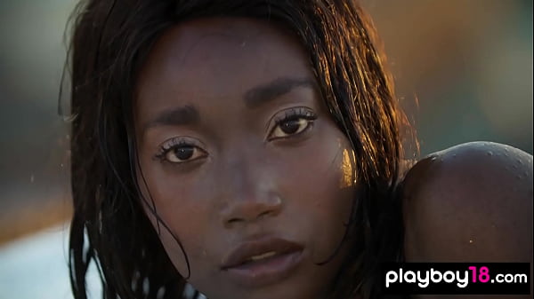 Smoking hot ebony teen Mimi Desuka stripping and unwinds on the rooftop