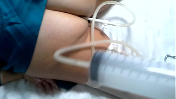 Cold enema of extra sparkling wine. Pain and pleasure